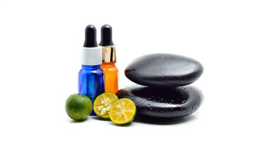 Essence oil, zen stone and calamansi in spa concept