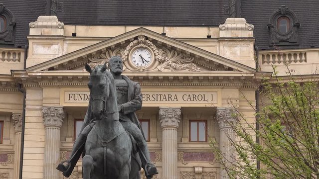 Bucharest, Romania - February 23 2020 - 4k video of Bucharest National Central University library building and statue of King Carol I of Romania. Closeup shot