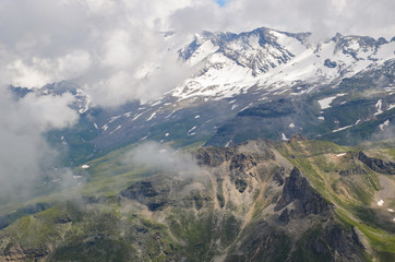 Cloudy view over the grossglockner mountain alps