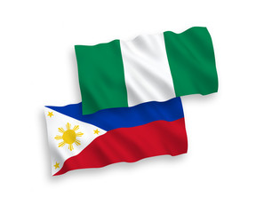 Flags of Philippines and Nigeria on a white background