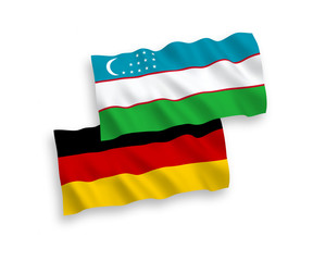 Flags of Uzbekistan and Germany on a white background