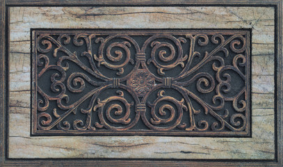 dark tile with arabic ornamental pattern