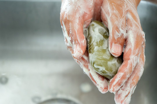 Washing Hands With Soap Bar And Water