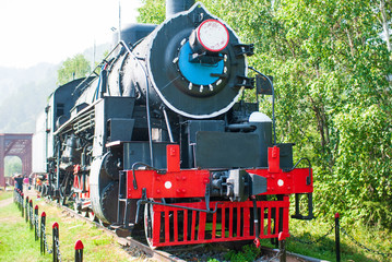 Museum steam locomotive on a pedestal