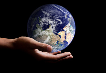 Businessman Holding Earth. Save Earth Concept. Elements of this image furnished by NASA