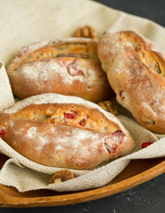 Homemade bread with nuts and dried fruits. Selective focus