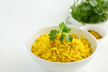 Vegetarian rice with curry and cashew nuts.