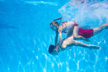 family in swimming pool