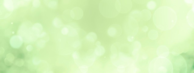 Spring background - abstract banner - green blurred bokeh lights 