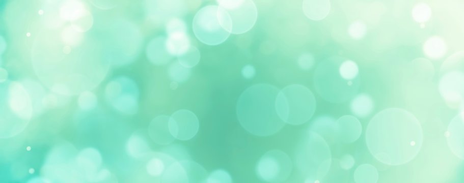Abstract background banner - blue, green, turquoise blurred bokeh lights