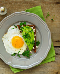 Sandwich with avocado and egg .. Healthy breakfast. Selective focus