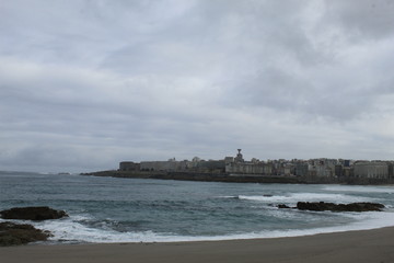 Waves on a beach in A coruna city in Spain
