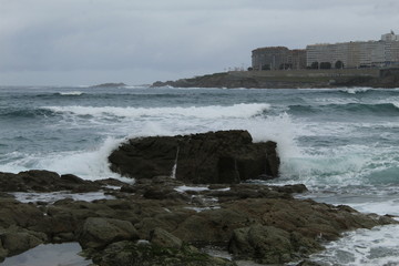 Waves on a beach in A coruna city in Spain