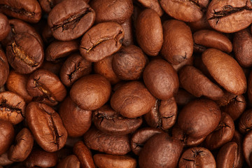 Photo of coffee beans, solid background, roasted coffee beans, texture of roasted coffee beans, high quality, close-up