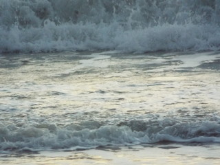 waves crashing on the beach
