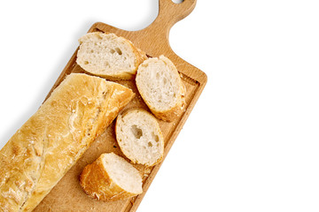 French lunch, breakfast baguette, Fresh natural French baguette, natural wooden cutting board, morning pastries from the bakery, delicate baguette, golden crust