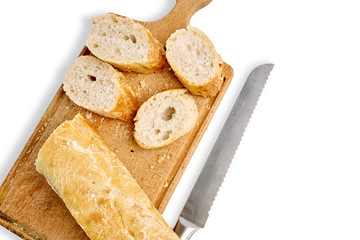 French lunch, breakfast baguette, Fresh natural French baguette, natural wooden cutting board, morning pastries from the bakery, delicate baguette, golden crust