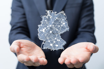 a virtual germany land  map digital in hand 3d