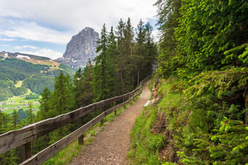 Fototapeta na wymiar Empty mountain trail in the Dolomites. Valgardena. Italy.