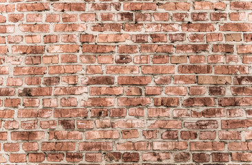 Fototapeta premium Old cracked red brick wall