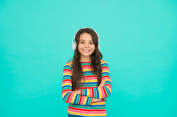 Fototapeta premium Audio translator. Technologies for studying. Girl listening song. Audio course. Modern technologies. Listening school book. Digital technologies for learning. Schoolgirl emotional child in headphones