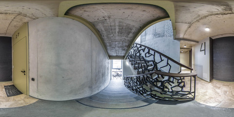 360 panorama view in loft entrance. Modern interior of hall in block of flats. Staircase.