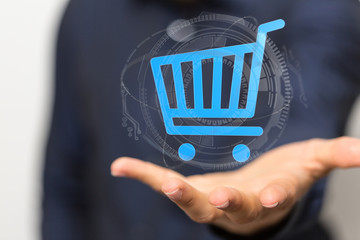 Businessman pressing modern technology panel shopping cart web phone credit card.