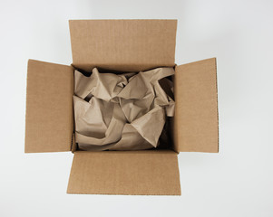 Cardboard box with paper for mail
