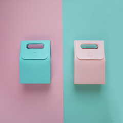 Mint and pink gift bags on background