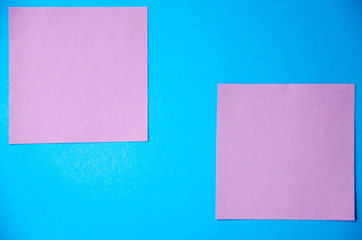 Multi-colored stickers for notes, reminders. On a blue background, stickers on the right and 5 pieces across the screen. Place for text. COPY Space