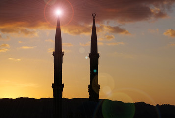 Evening clouds and two minarets of mosque in Sharm El Sheikh, Egypt