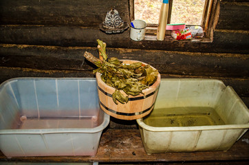 Bath broom is steamed in a bath in a van