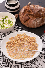 Breakfast cereal with milk, cottage cheese, ready to eat on the table