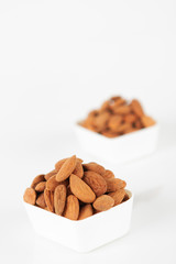 Group of almonds on white background