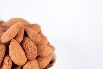 Group of almonds on white background