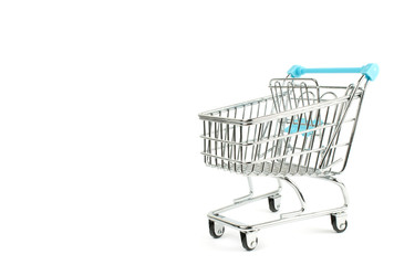 The cart of a supermarket on the white isolate.