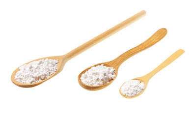 Corn starch in a wooden spoon Isolated on a white background.