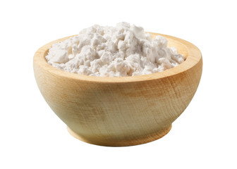 Wooden  plate with potato starch isolated on a white background.