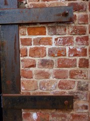 a fragment of a worn old brick wall as a background