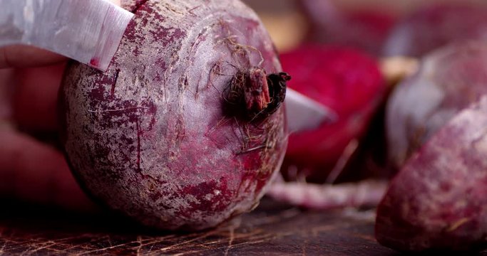 Sliced fresh beets on a cutting Board.