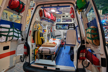 Emergency medical service, View inside the ambulance and the sanitary compartment. Various medical equipment and a tray. Selective focus © DannyIacob