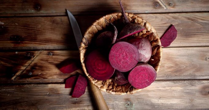 Rotating fresh pieces of beets in the basket.