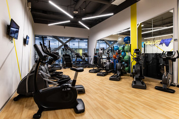 Fototapeta na wymiar interior background of room in gym or fitness center 