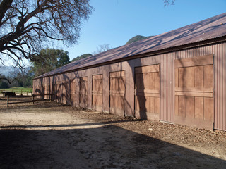 Fototapeta na wymiar Rustic US National Park owned historic movie town barn in the Santa Monica Mountains National Recreation Area near Los Angeles Ca. The buildings were destroyed in the 2018 Woolsey fire.