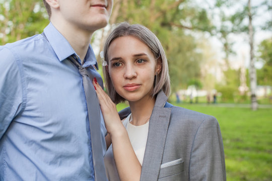 Girl and male shoulder, outdoor portrait