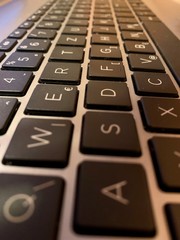 closeup of keyboard — keyboard buttons getting smaller and farther