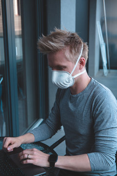 Man wearing FFP3 face mask respirator against flu 