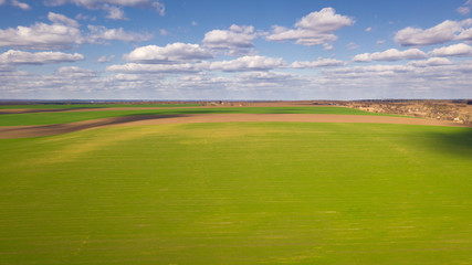 Birds eye view of Ukrainian spring landscape. Natural background on a sunny day. Photo of the countryside.