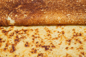 Thin pancakes close up texture background