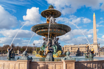 The Maritime Fountain with Luxor Obelisk in the background at the place de la Concorde - Paris, France - obrazy, fototapety, plakaty